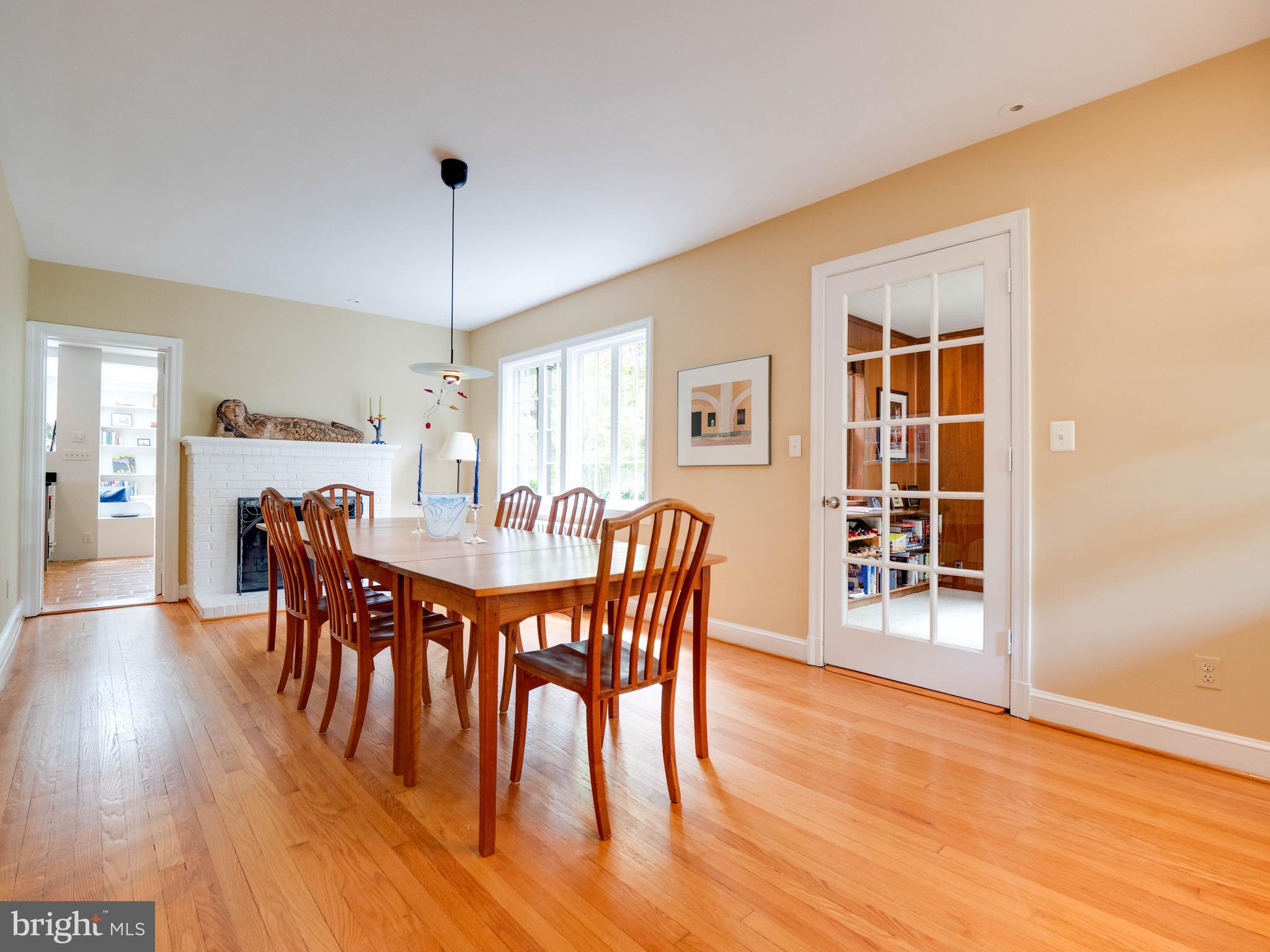 3820 Chesterbrook Road Arlington, VA 22207 - Photo 15 of 43 Dining room with wood burning fireplace