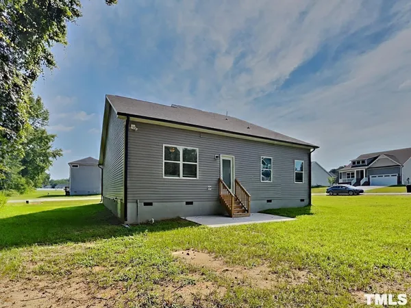 a house view with a garden space