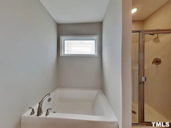 a bathroom with a bathtub