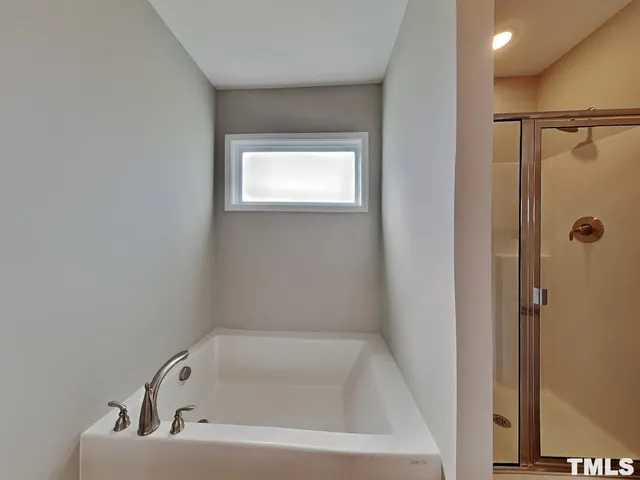 a bathroom with a bathtub