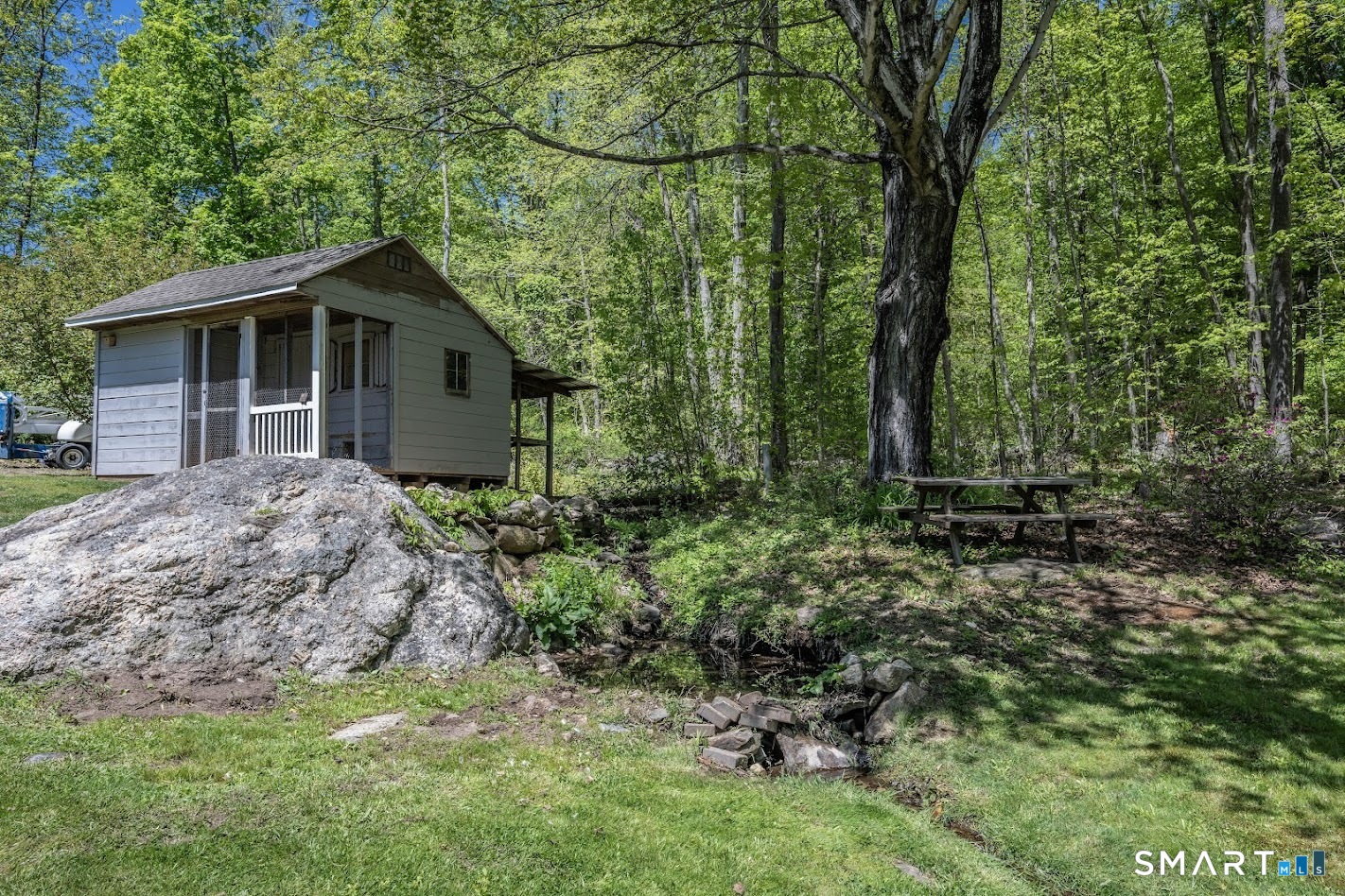 394 Brainard Hill Road Haddam, CT 06441 - Photo 21 of 23 a backyard of a house with lots of green space
