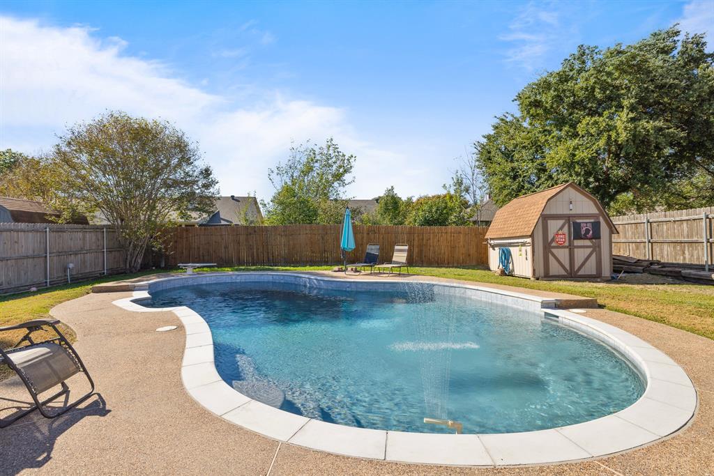 8221 Mark Lane Watauga, TX 76148 - Photo 1 of 1 a view of swimming pool with seating space