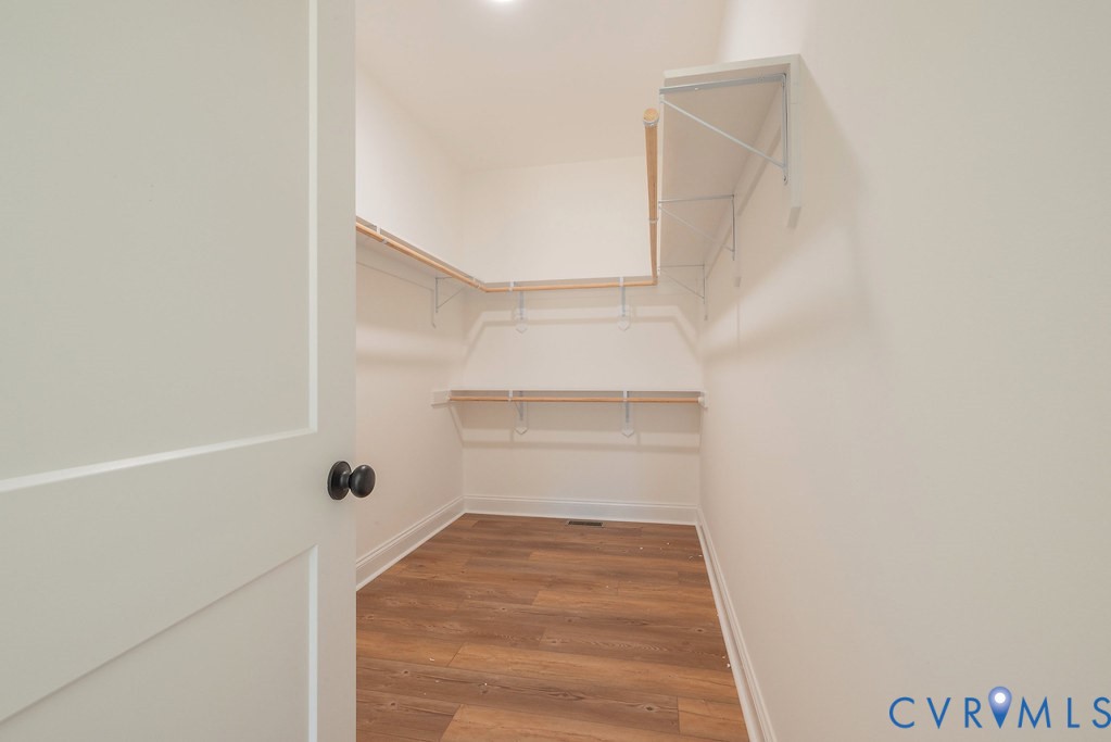 5200 Three Chopt Road Louisa, VA 23093 - Photo 20 of 47 a view of walk in closet with empty racks