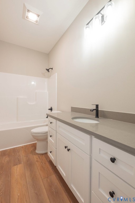 5200 Three Chopt Road Louisa, VA 23093 - Photo 30 of 47 a bathroom with a granite countertop sink a toilet and bathtub