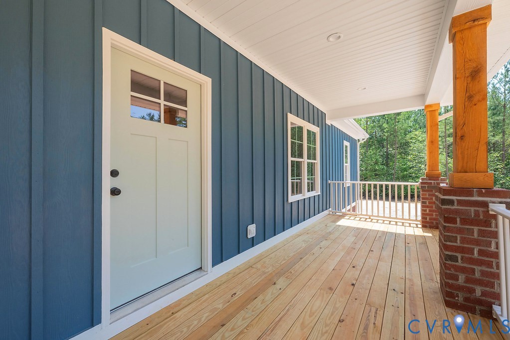 5200 Three Chopt Road Louisa, VA 23093 - Photo 8 of 47 a view of backyard with a deck