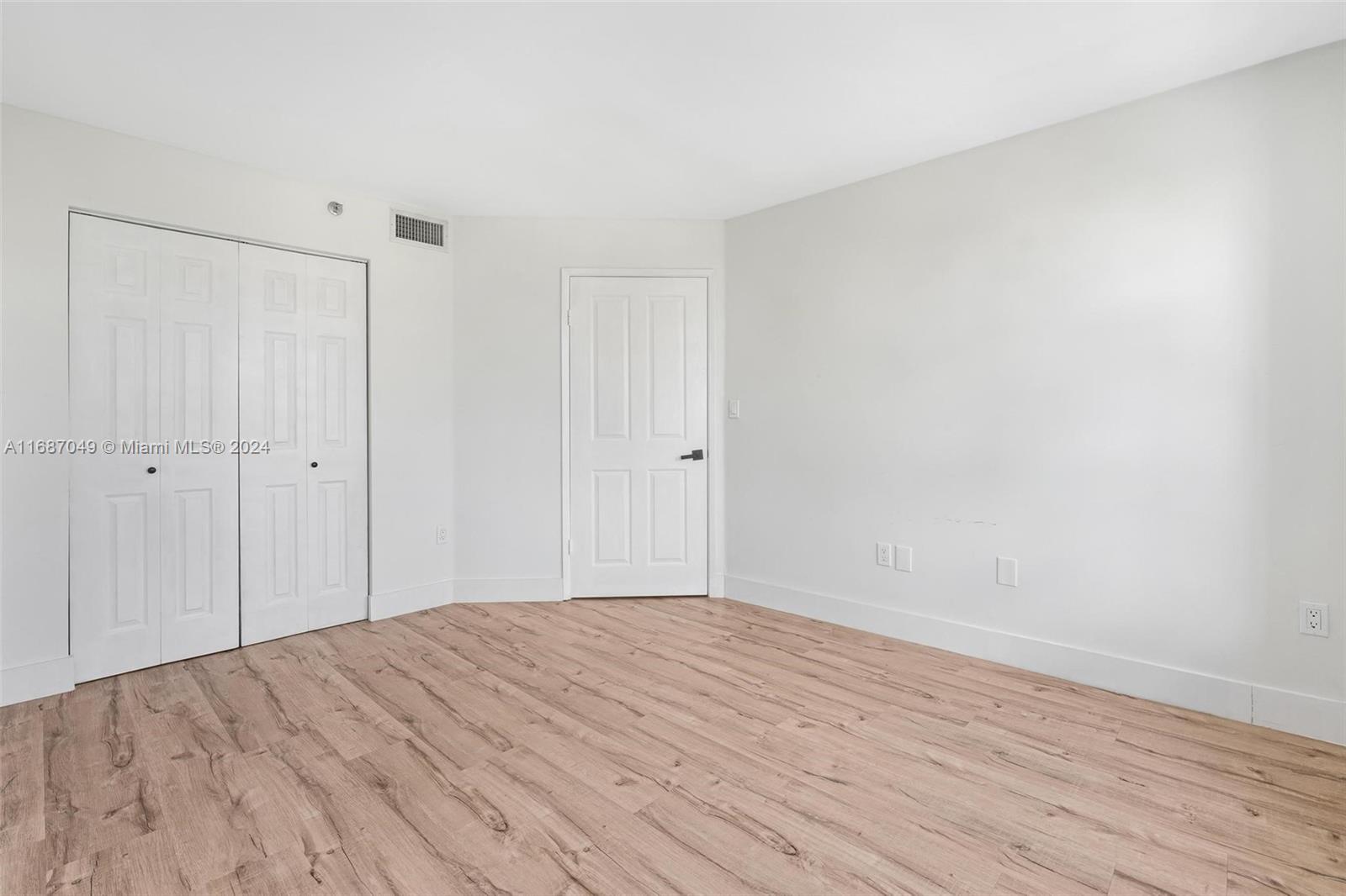 2351 Douglas Road, Unit 504 Miami, FL 33145 - Photo 17 of 41 a view of a room with wooden floor