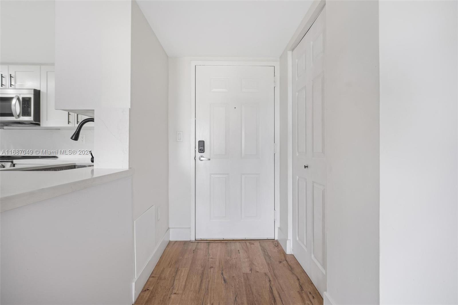 2351 Douglas Road, Unit 504 Miami, FL 33145 - Photo 3 of 41 a bathroom with a sink and a mirror