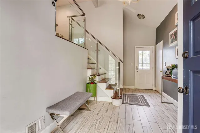 a living room with furniture and a table