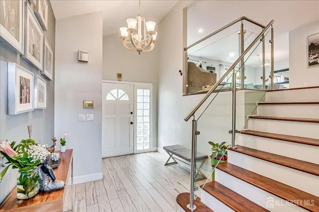a view of entryway with wooden floor