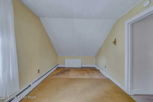 a view of a room with wooden racks
