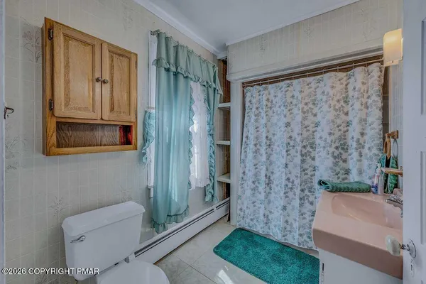 a view of a utility room with a door