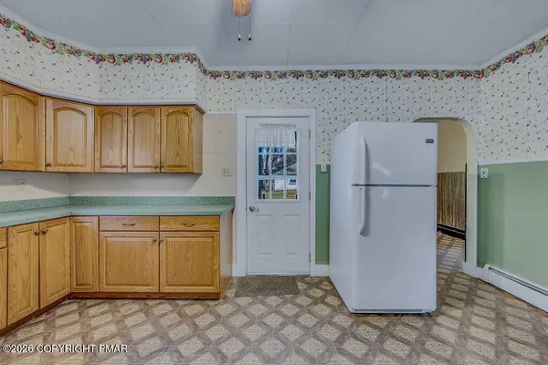 a view of empty room with floor to ceiling window