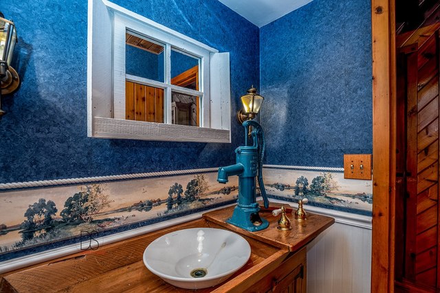 780 North 2229th Road Tonica, IL 61370 - Photo 22 of 44 a kitchen with a sink and a stove