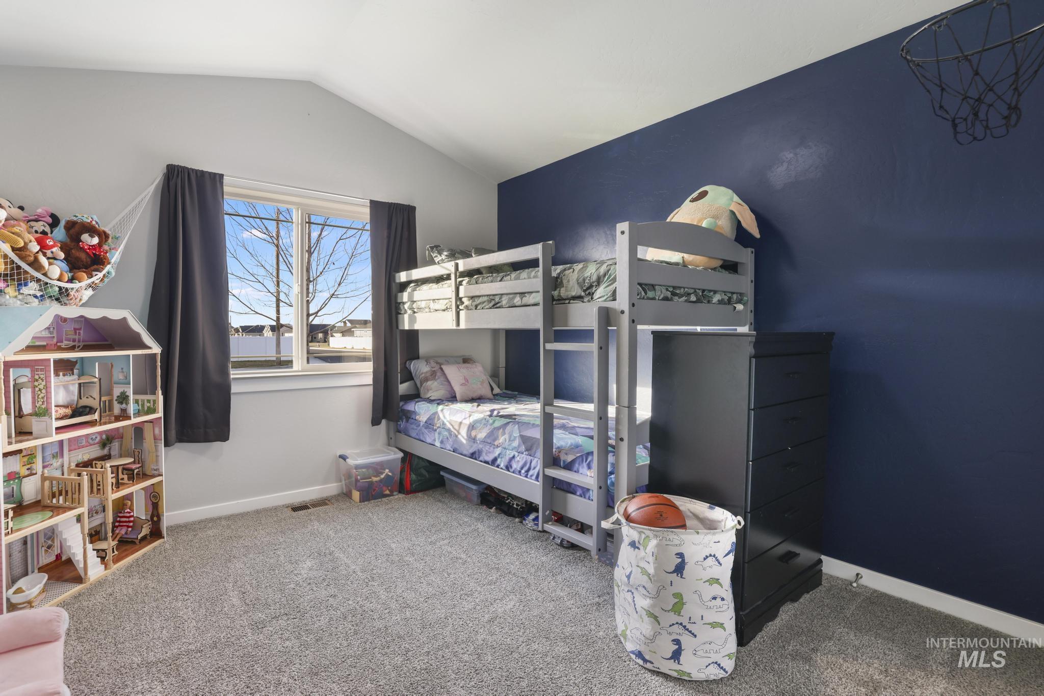 2396 Village Street Twin Falls, ID 83301 - Photo 30 of 44 Bedroom featuring light colored carpet and lofted ceiling