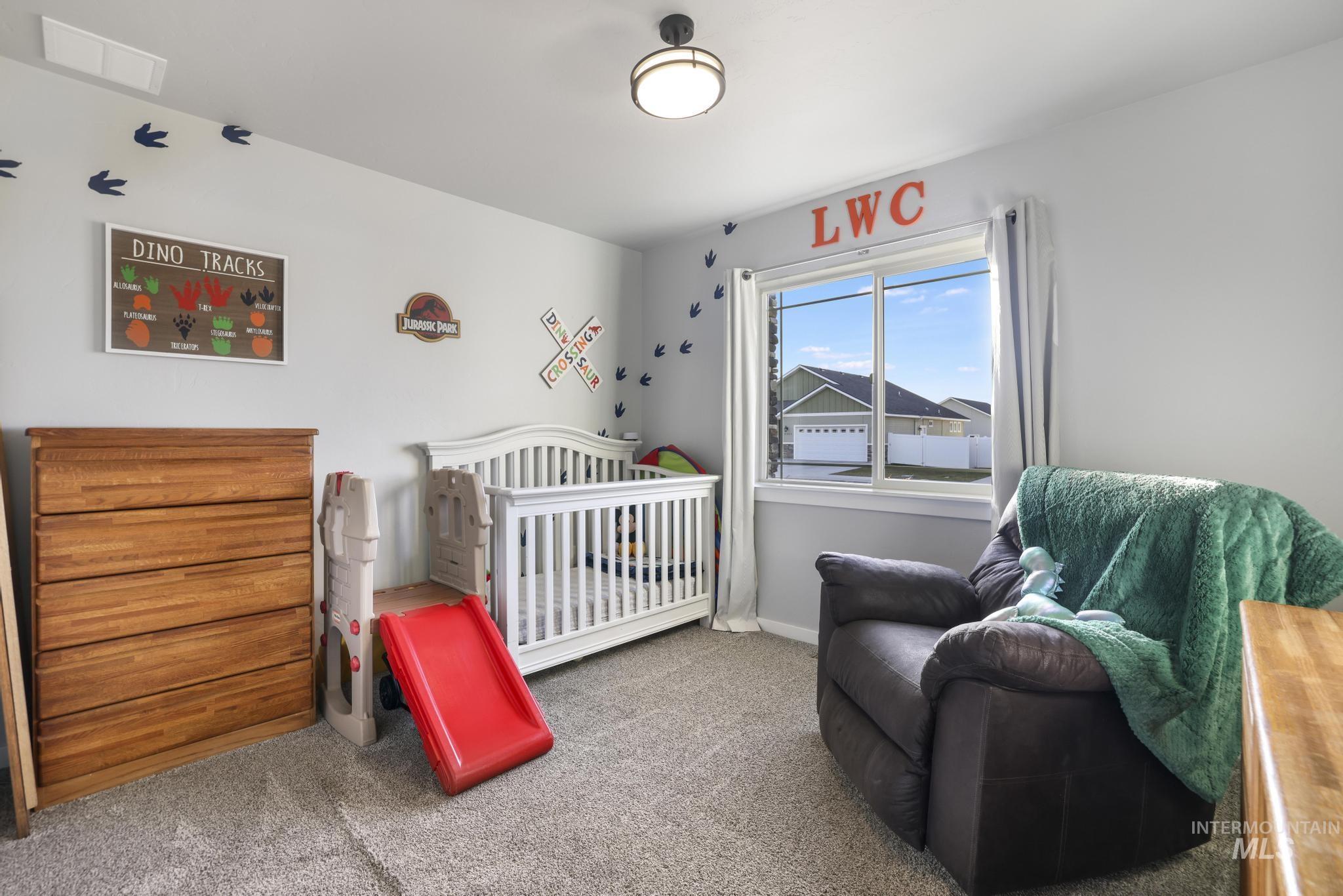 2396 Village Street Twin Falls, ID 83301 - Photo 33 of 44 Bedroom featuring carpet and a nursery area