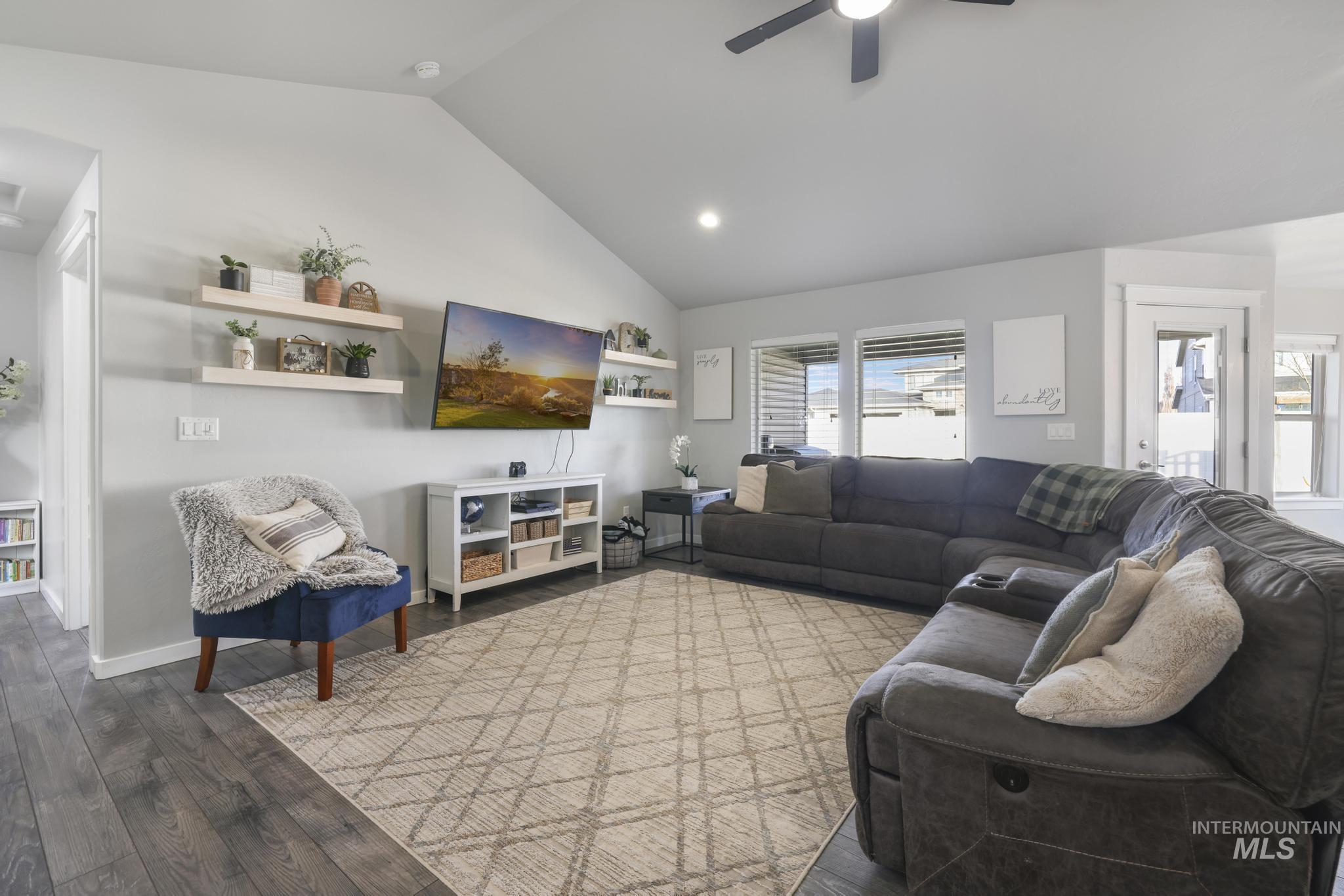 2396 Village Street Twin Falls, ID 83301 - Photo 10 of 44 Living area with vaulted ceiling, wood-type flooring, ceiling fan, and recessed lighting