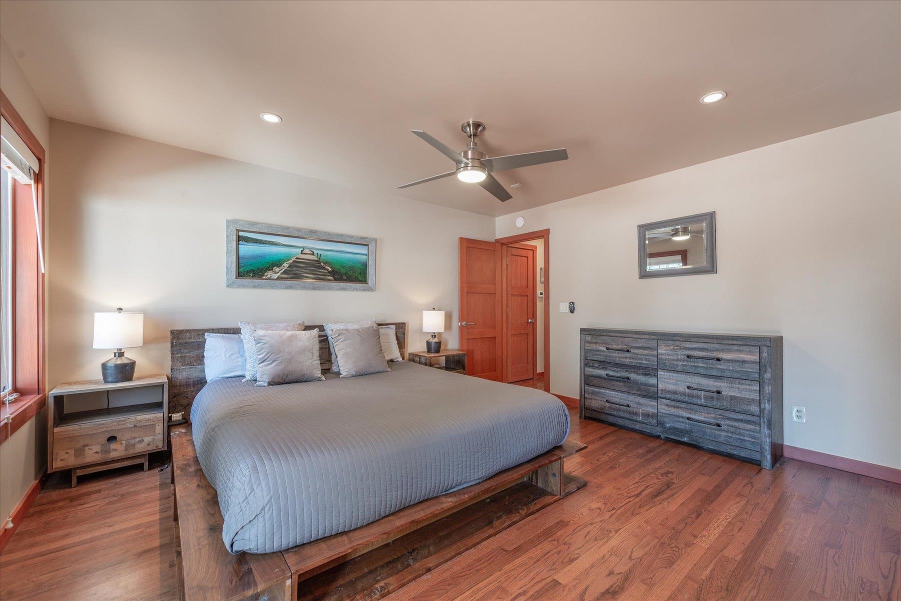 12676 Pinnacle Loop Truckee, CA 96161 - Photo 13 of 19 a bedroom with a bed and a ceiling fan