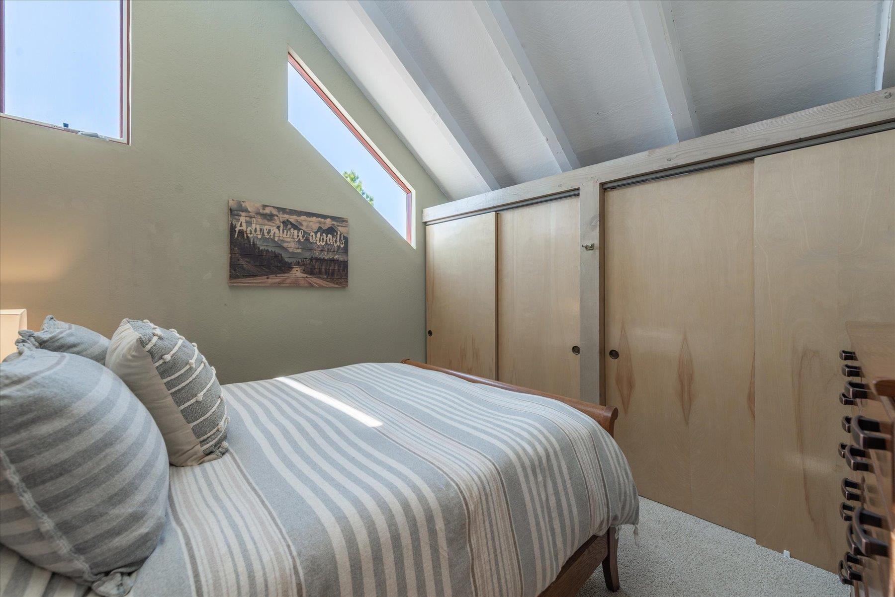 12676 Pinnacle Loop Truckee, CA 96161 - Photo 15 of 19 a bedroom with a bed and a window