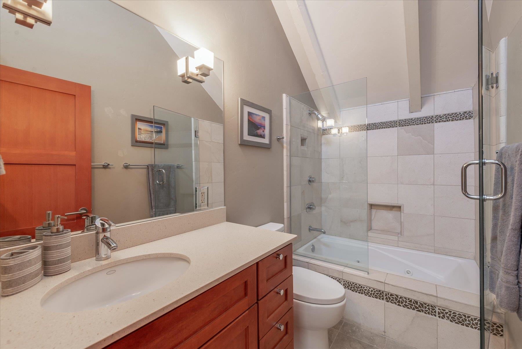 12676 Pinnacle Loop Truckee, CA 96161 - Photo 16 of 19 a bathroom with a sink a toilet and shower