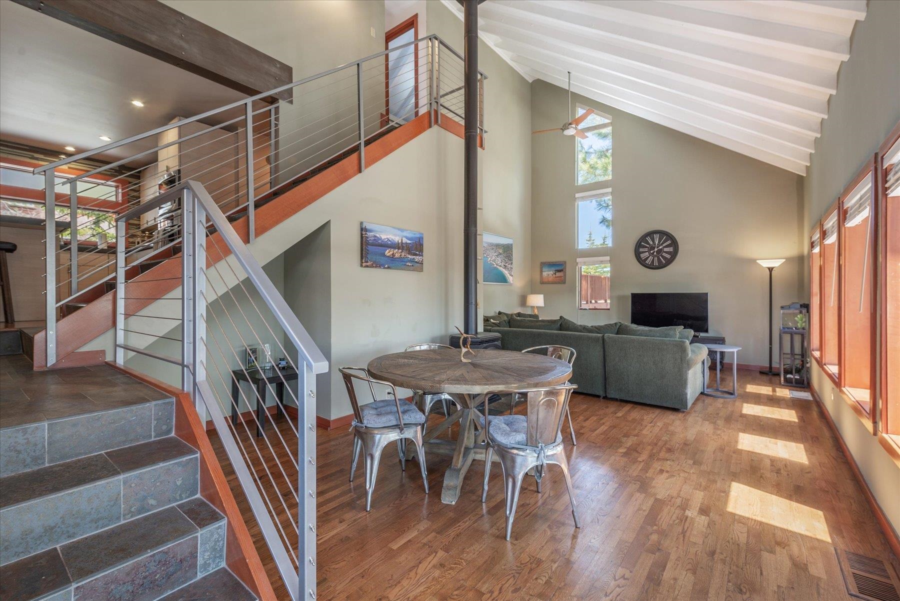 12676 Pinnacle Loop Truckee, CA 96161 - Photo 8 of 19 a view of a dining room with furniture and wooden floor