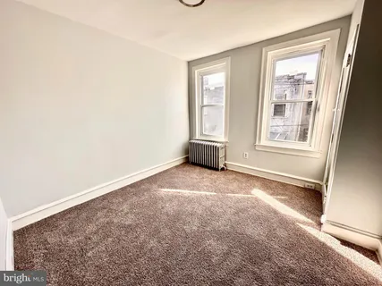 a view of livingroom with hardwood floor and window
