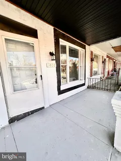 a view of front door and deck