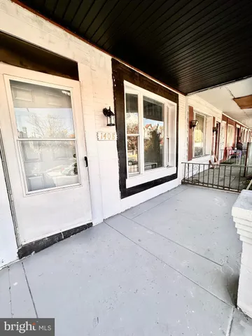 a view of front door and deck