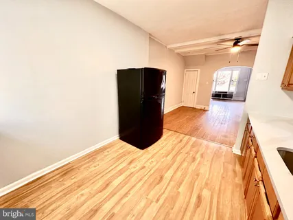 a bedroom with a bed and a mirror