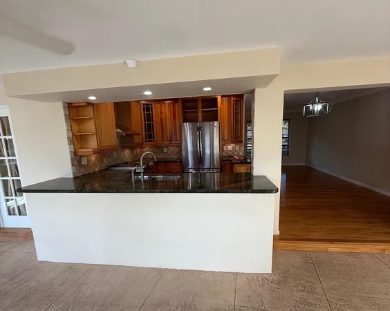 a living room with furniture and window