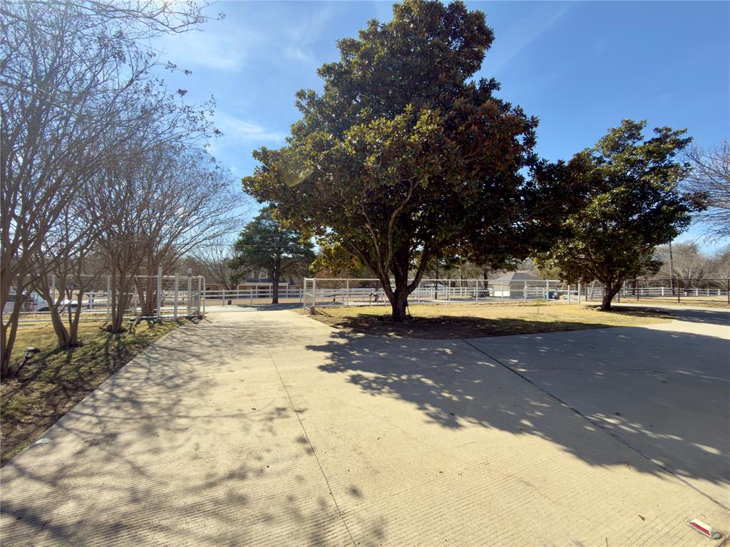 1544 Stainback Road Red Oak, TX 75154 - Photo 40 of 40 looking out from the house. Heavy duty pipe fencing with one rolling gate, material for second gate on other side