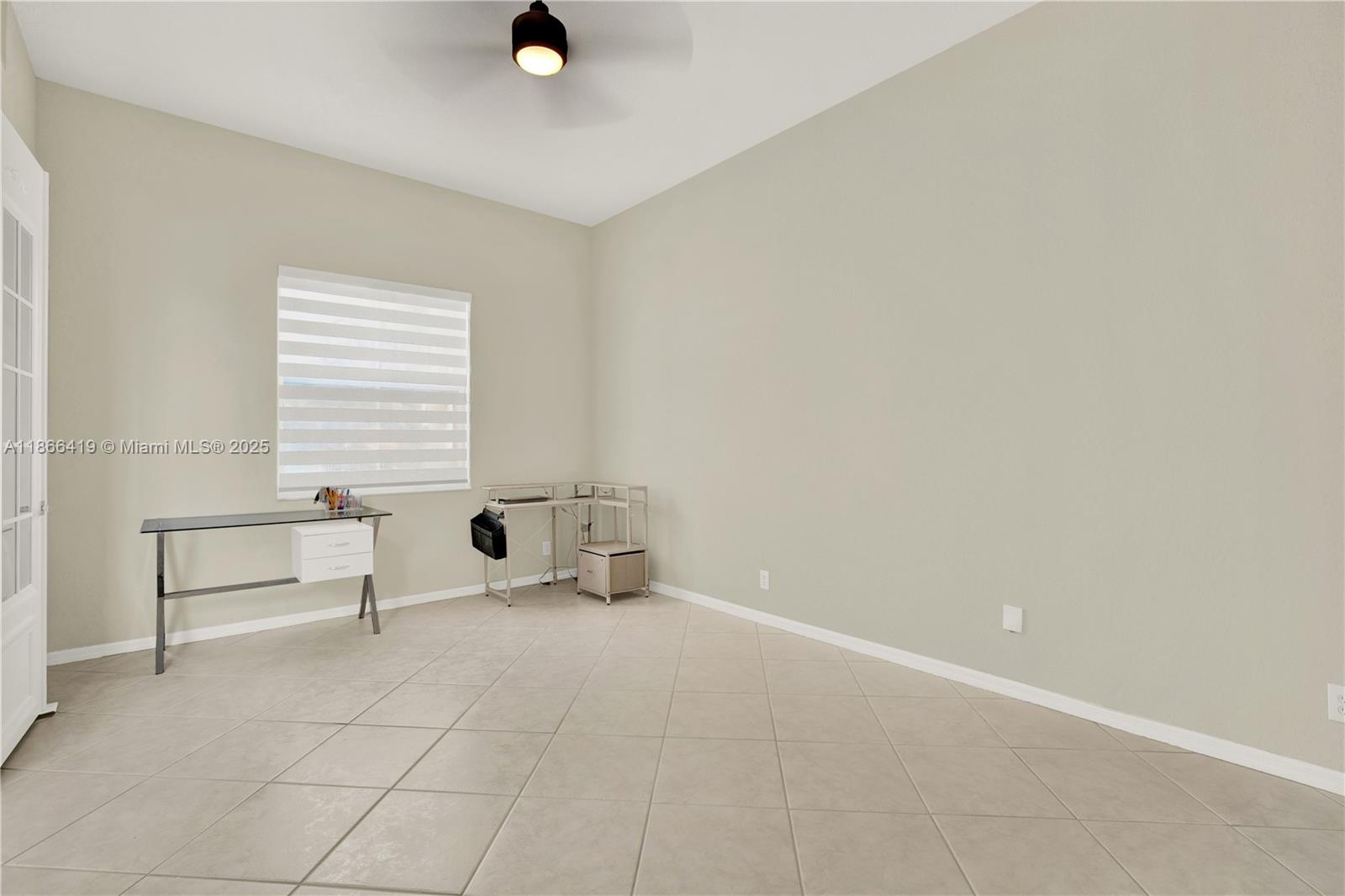 18708 Ocean Mist Drive Boca Raton, FL 33498 - Photo 18 of 58 a view of an empty room with a window