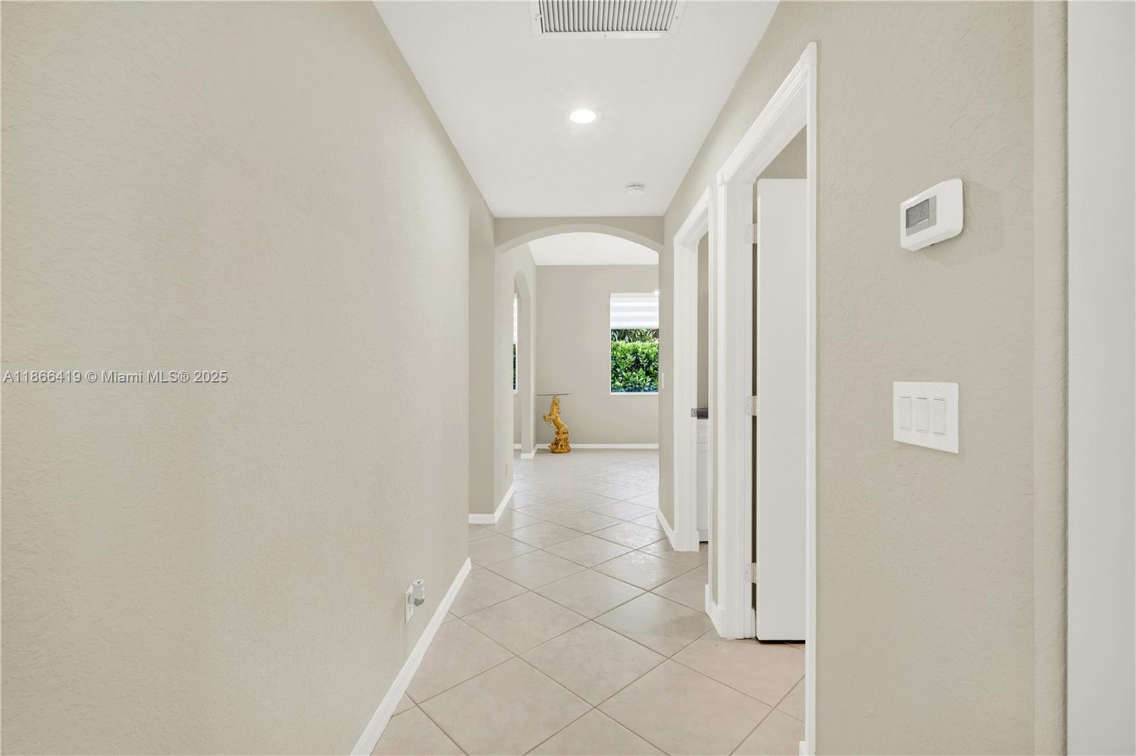 18708 Ocean Mist Drive Boca Raton, FL 33498 - Photo 25 of 58 a view of a hallway