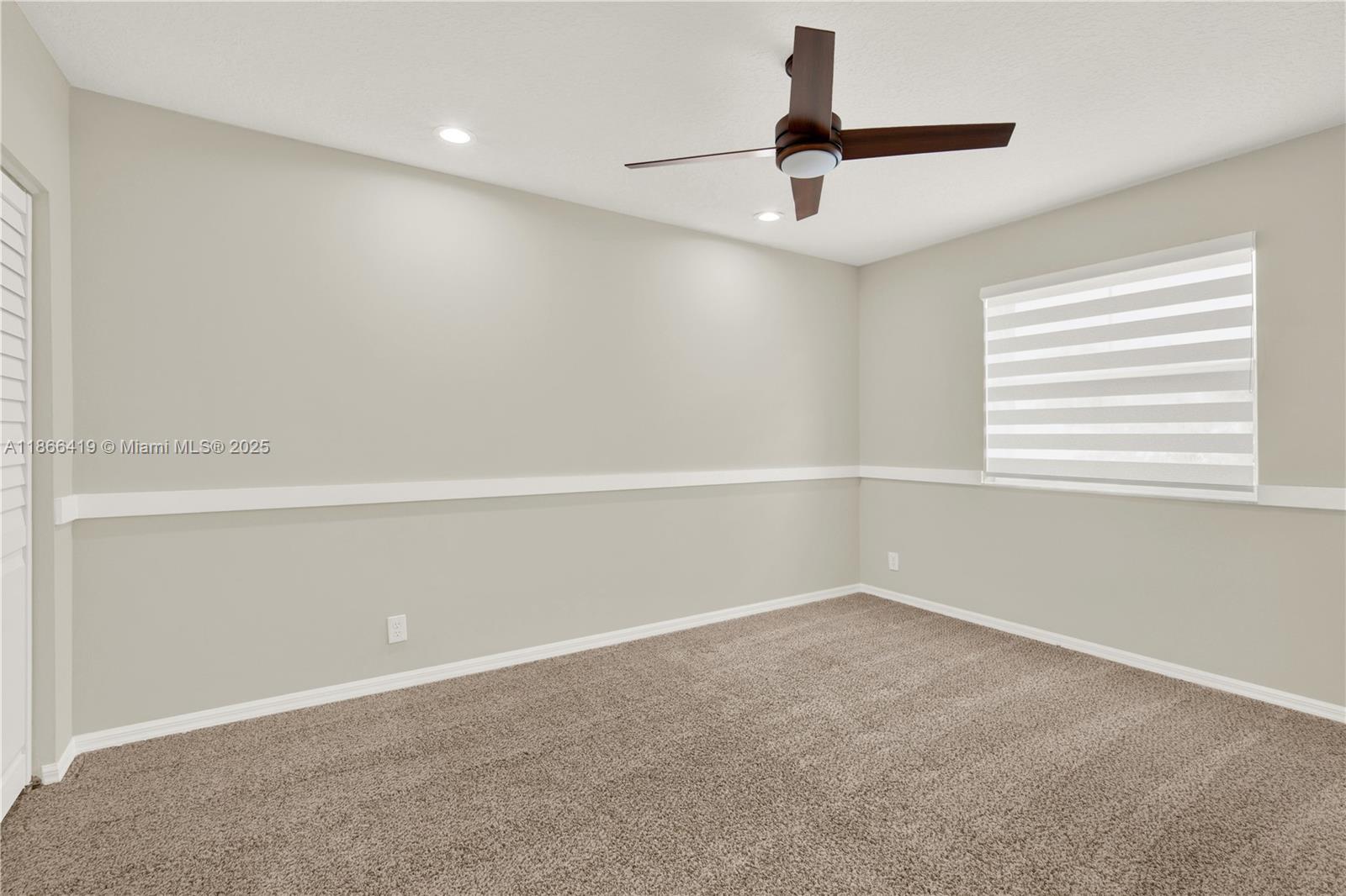 18708 Ocean Mist Drive Boca Raton, FL 33498 - Photo 33 of 58 a view of an empty room with a window