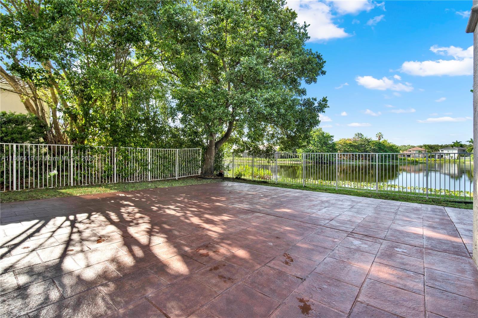 18708 Ocean Mist Drive Boca Raton, FL 33498 - Photo 48 of 58 a view of a yard with a large trees