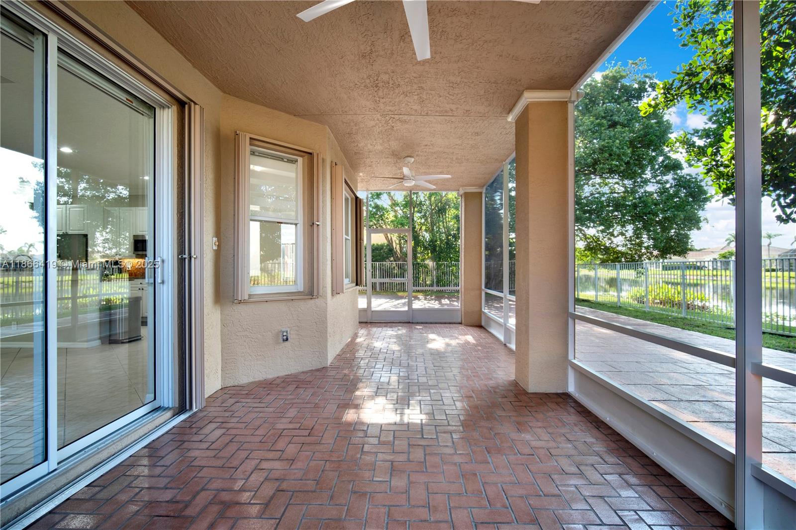 18708 Ocean Mist Drive Boca Raton, FL 33498 - Photo 50 of 58 a view of a large room with large windows