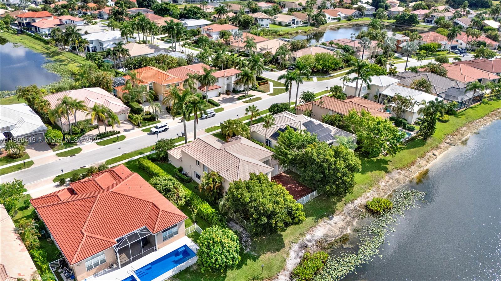 18708 Ocean Mist Drive Boca Raton, FL 33498 - Photo 6 of 58 an aerial view of residential houses with outdoor space