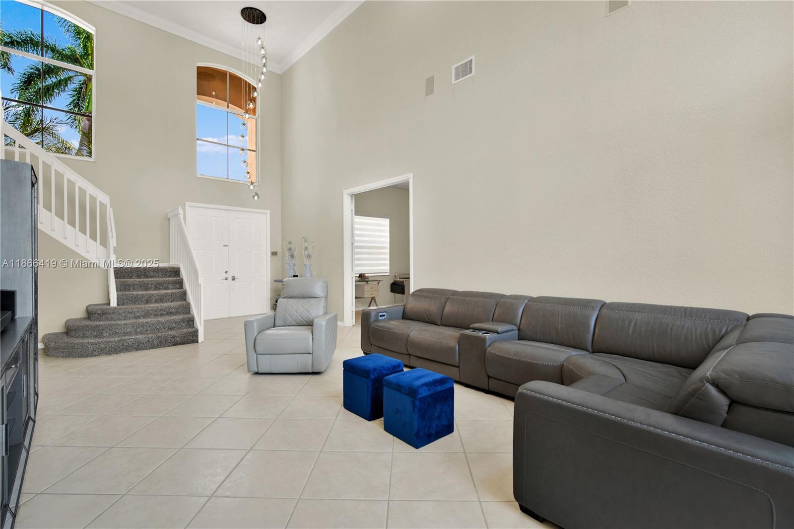 18708 Ocean Mist Drive Boca Raton, FL 33498 - Photo 10 of 58 a living room with furniture and a couch