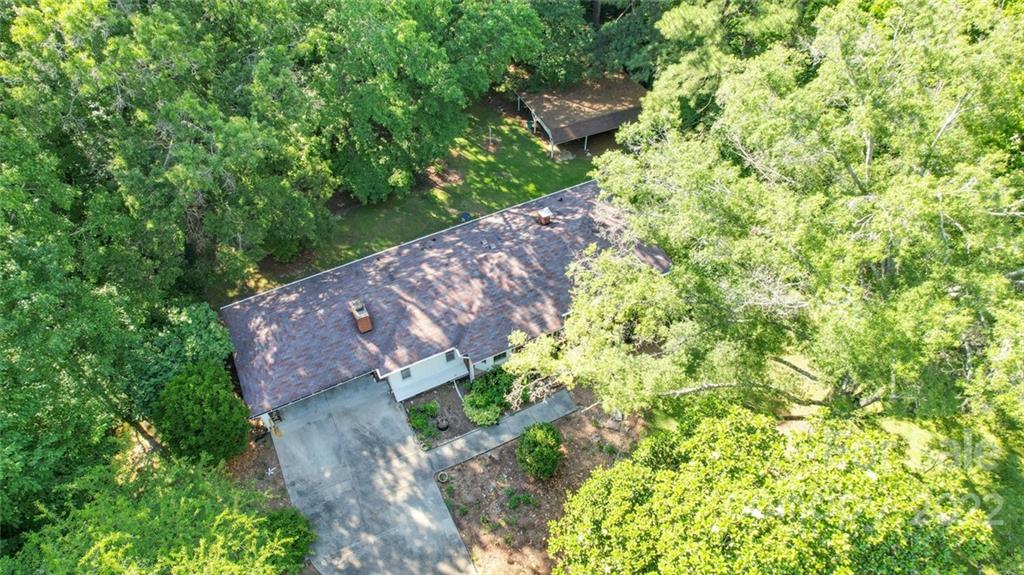 699 Bailey Road Lancaster, SC 29720 - Photo 23 of 43 a backyard of a house with lots of green space