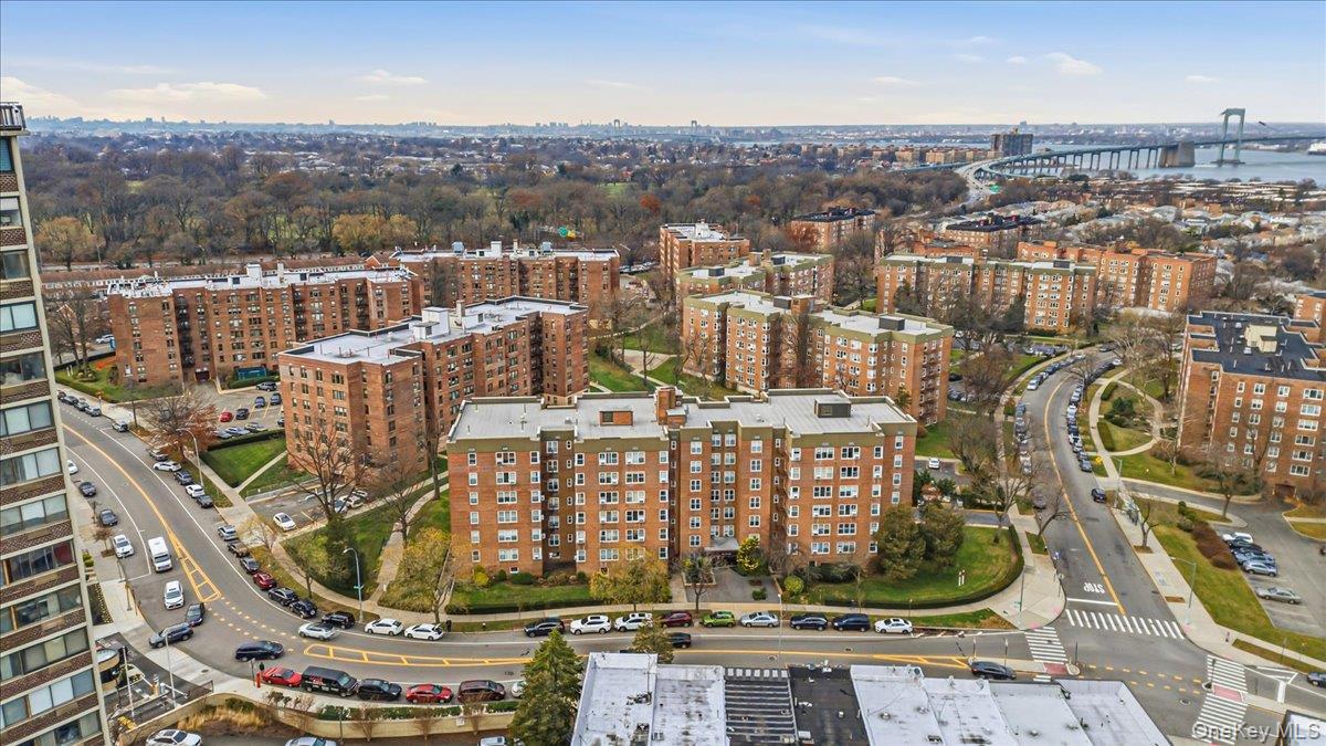 210-15 23rd Avenue, Unit 3F Queens, NY 11360 - Photo 1 of 24 a view of a city with tall buildings