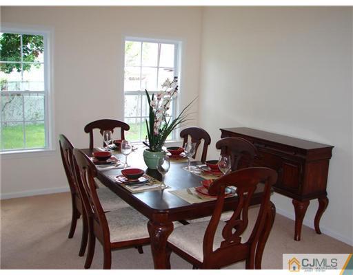 963 Clark Road North Brunswick, NJ 08902 - Photo 4 of 6 a view of a dining room with furniture and window