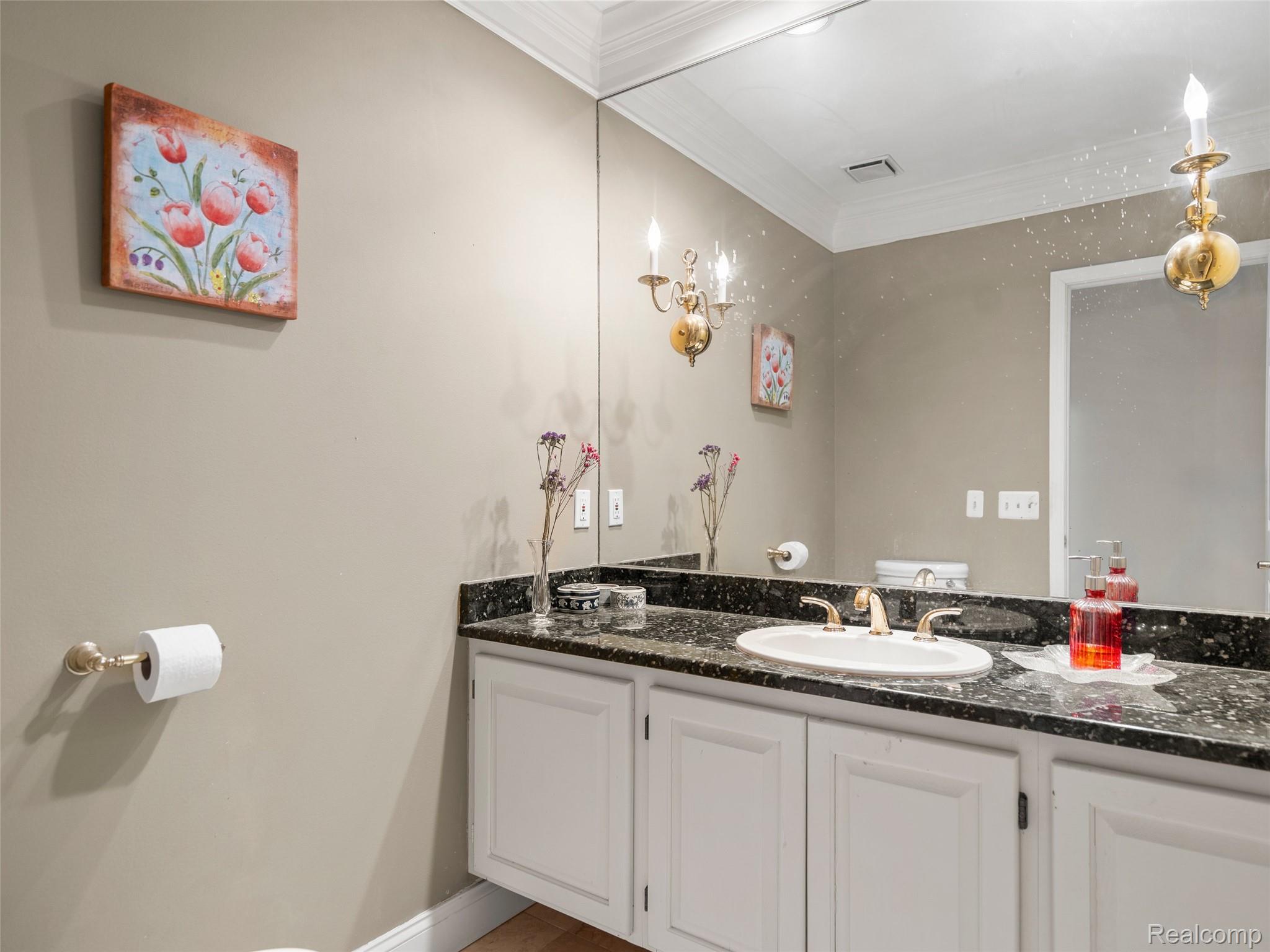 5724 Murfield Drive Rochester, MI 48306 - Photo 65 of 99 Half bathroom featuring vanity and crown molding