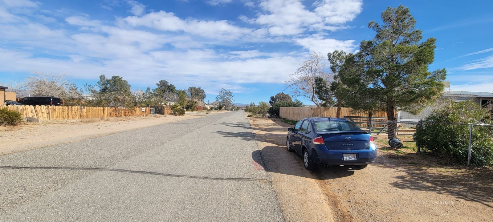 1435 West Perch Avenue Ridgecrest, CA 93555 - Photo 2 of 40 a car parked on the side of the road