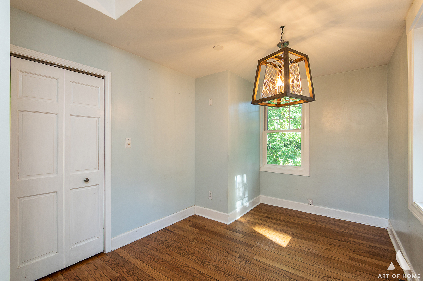8813 Wolf Road Burr Ridge, IL 60527 - Photo 11 of 34 a view of empty room with wooden floor and fan