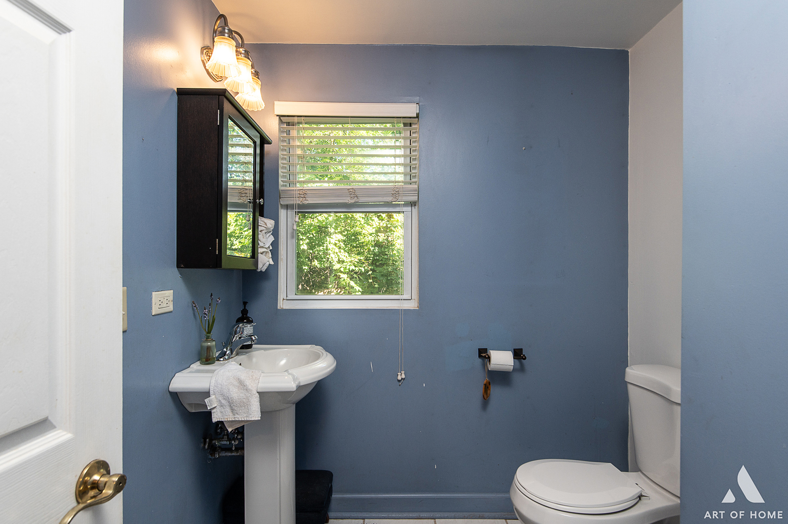 8813 Wolf Road Burr Ridge, IL 60527 - Photo 13 of 34 a bathroom with a sink toilet and a mirror