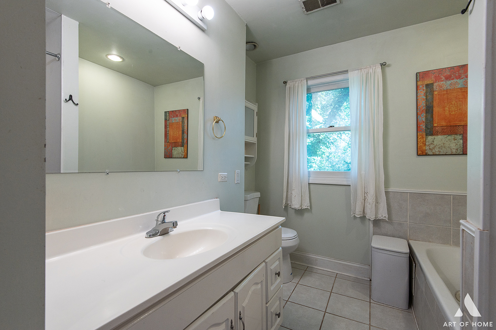 8813 Wolf Road Burr Ridge, IL 60527 - Photo 16 of 34 a bathroom with a sink toilet and vanity