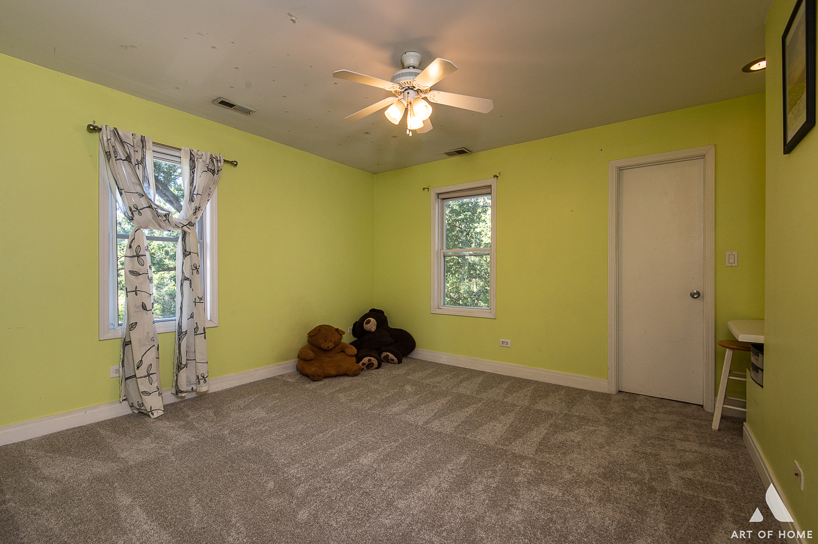 8813 Wolf Road Burr Ridge, IL 60527 - Photo 19 of 34 a bed room with a bed and a chandelier