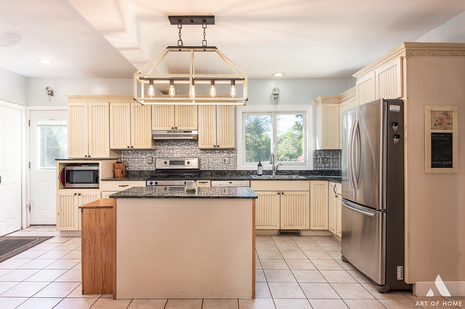 8813 Wolf Road Burr Ridge, IL 60527 - Photo 2 of 34 a kitchen with stainless steel appliances granite countertop a stove a refrigerator a sink and white cabinets