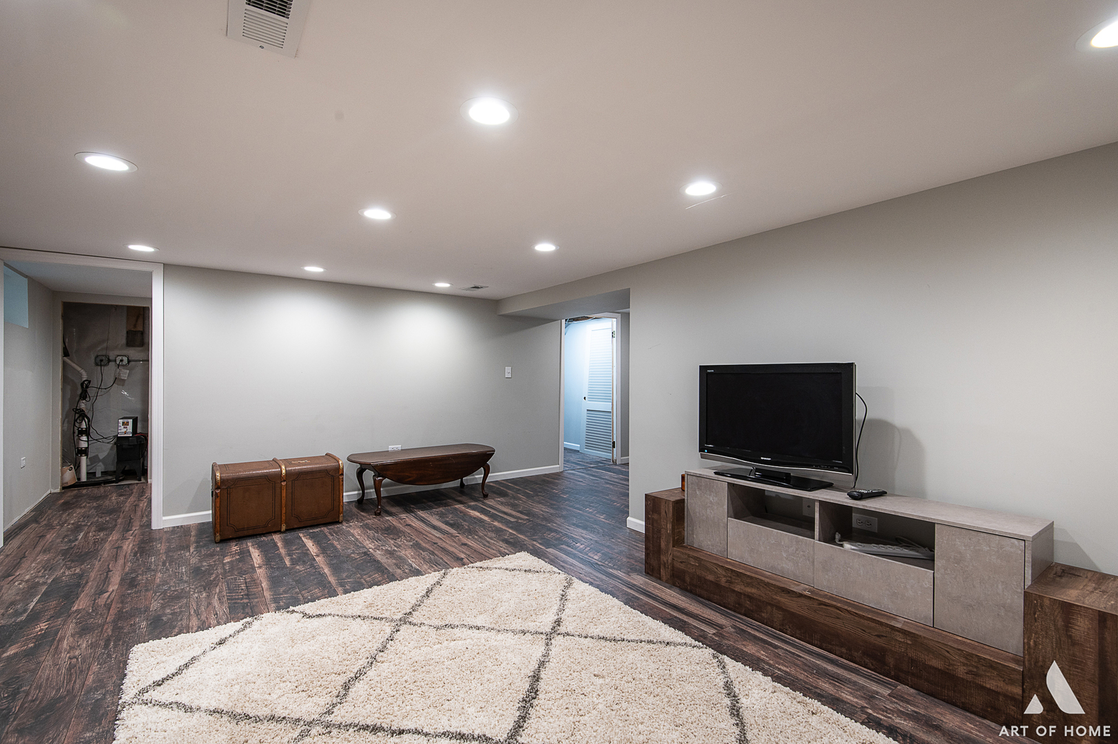 8813 Wolf Road Burr Ridge, IL 60527 - Photo 22 of 34 a living room with furniture and a flat screen tv