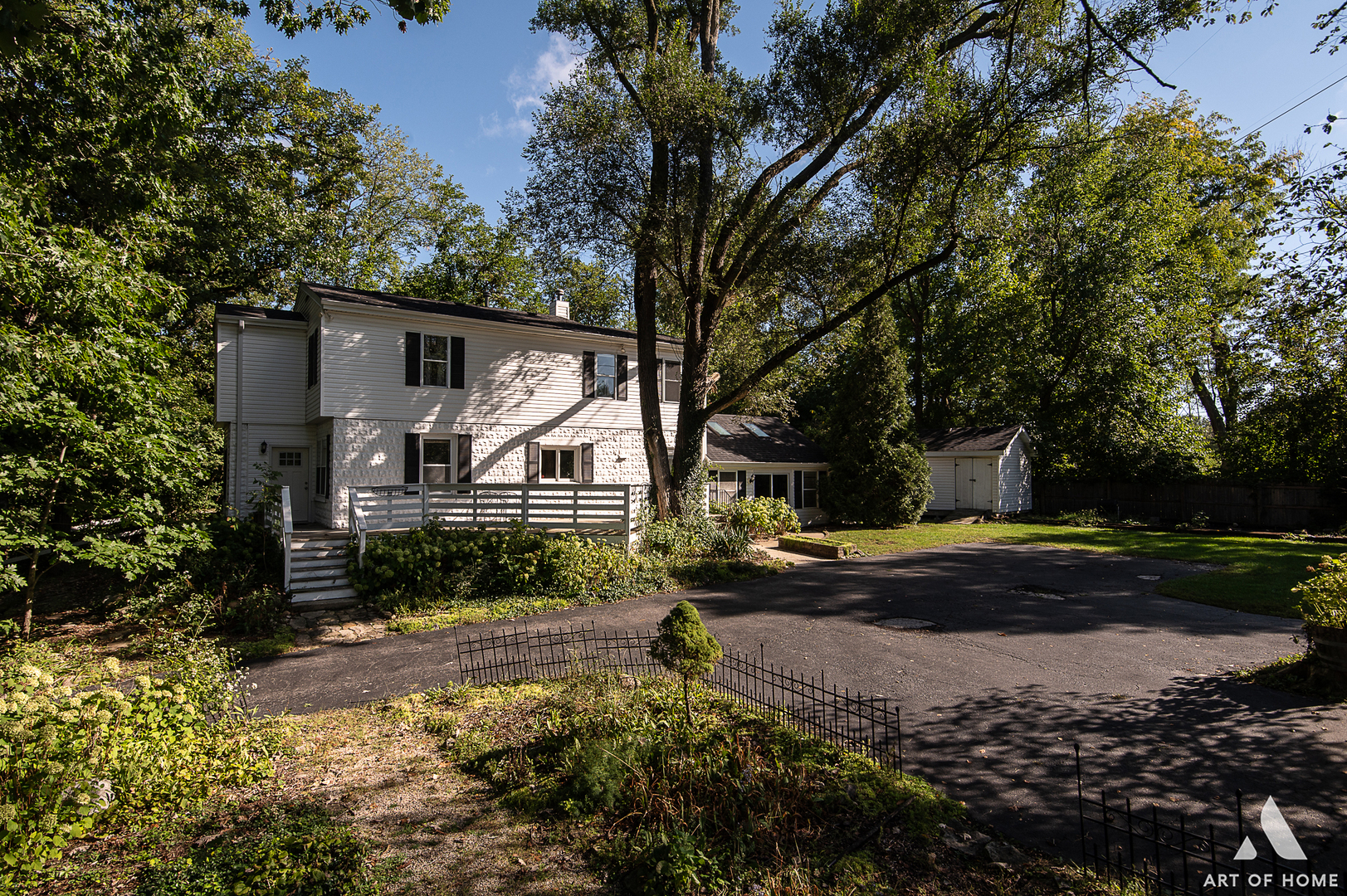 8813 Wolf Road Burr Ridge, IL 60527 - Photo 23 of 34 a front view of a house with a yard