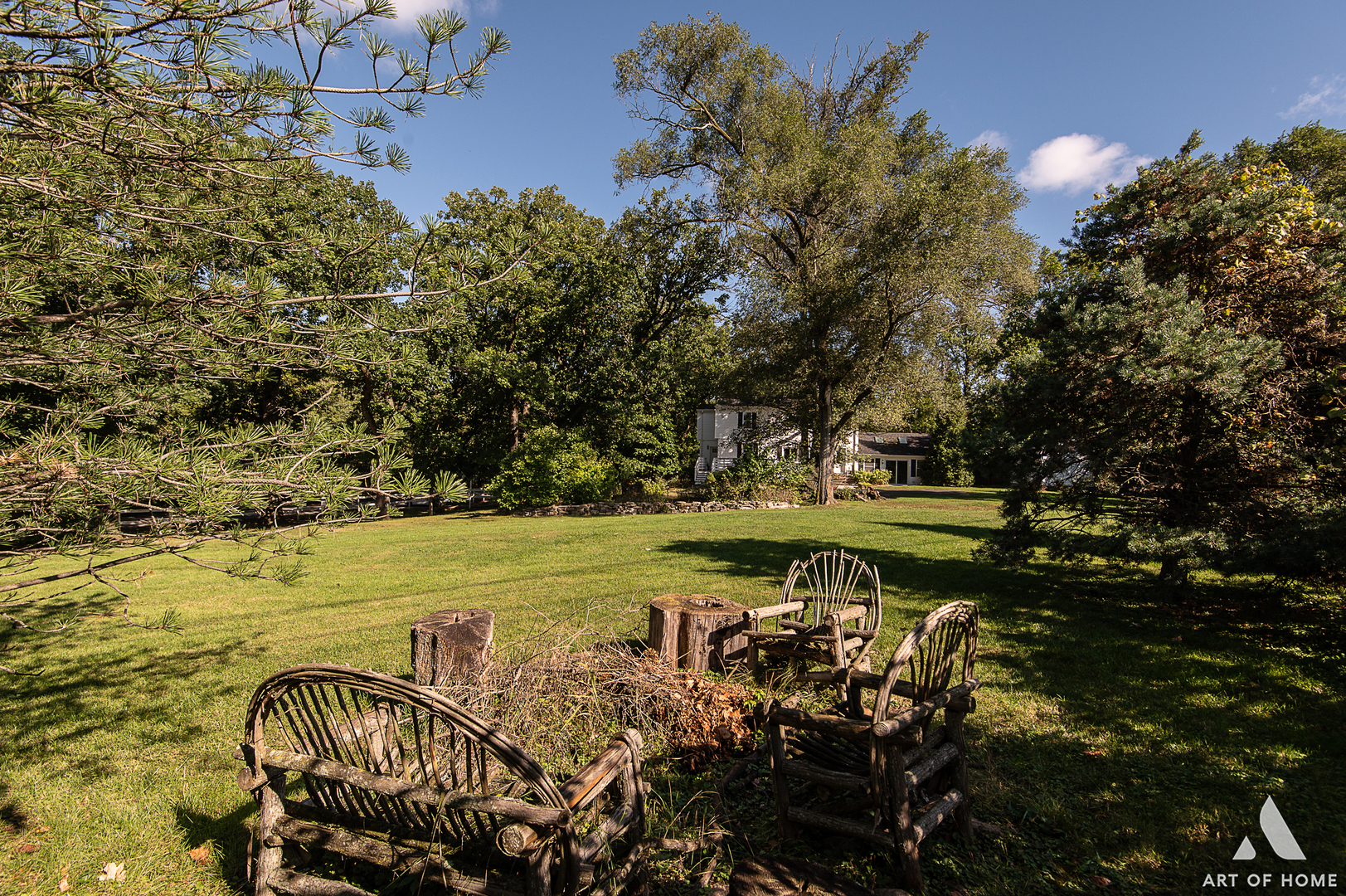 8813 Wolf Road Burr Ridge, IL 60527 - Photo 25 of 34 a view of a swimming pool with a table and chairs under an umbrella